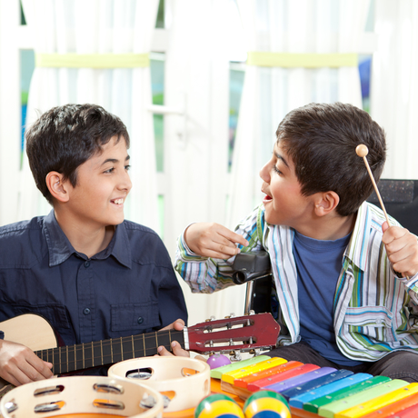 Disabled boys in a music class.